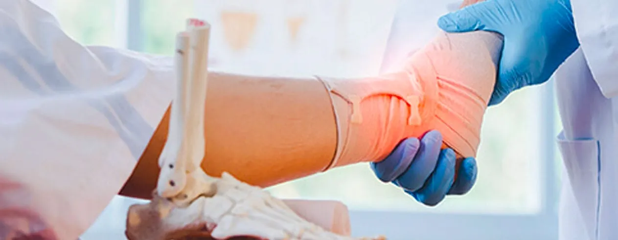 Ankle specialist conducting a clinical diagnosis