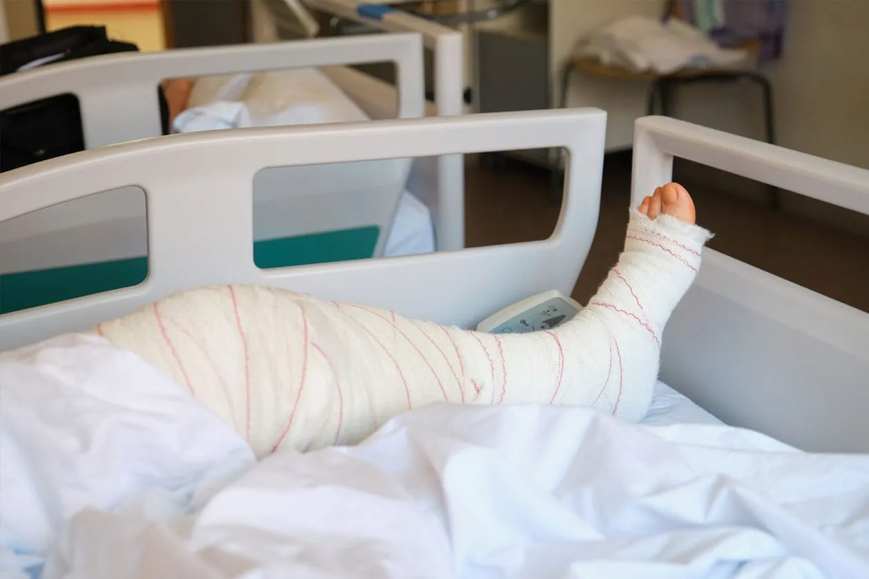 A patient recovering after ankle replacement surgery